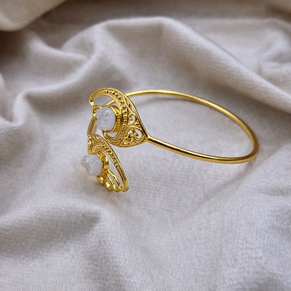 Designer Gold Bangle Bracelet with Artistic Leaf Pattern