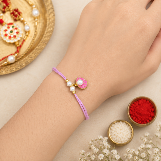 Gold Plated Pink Shell Pearl Rakhi for Men Women Raksha Bandhan RB-319